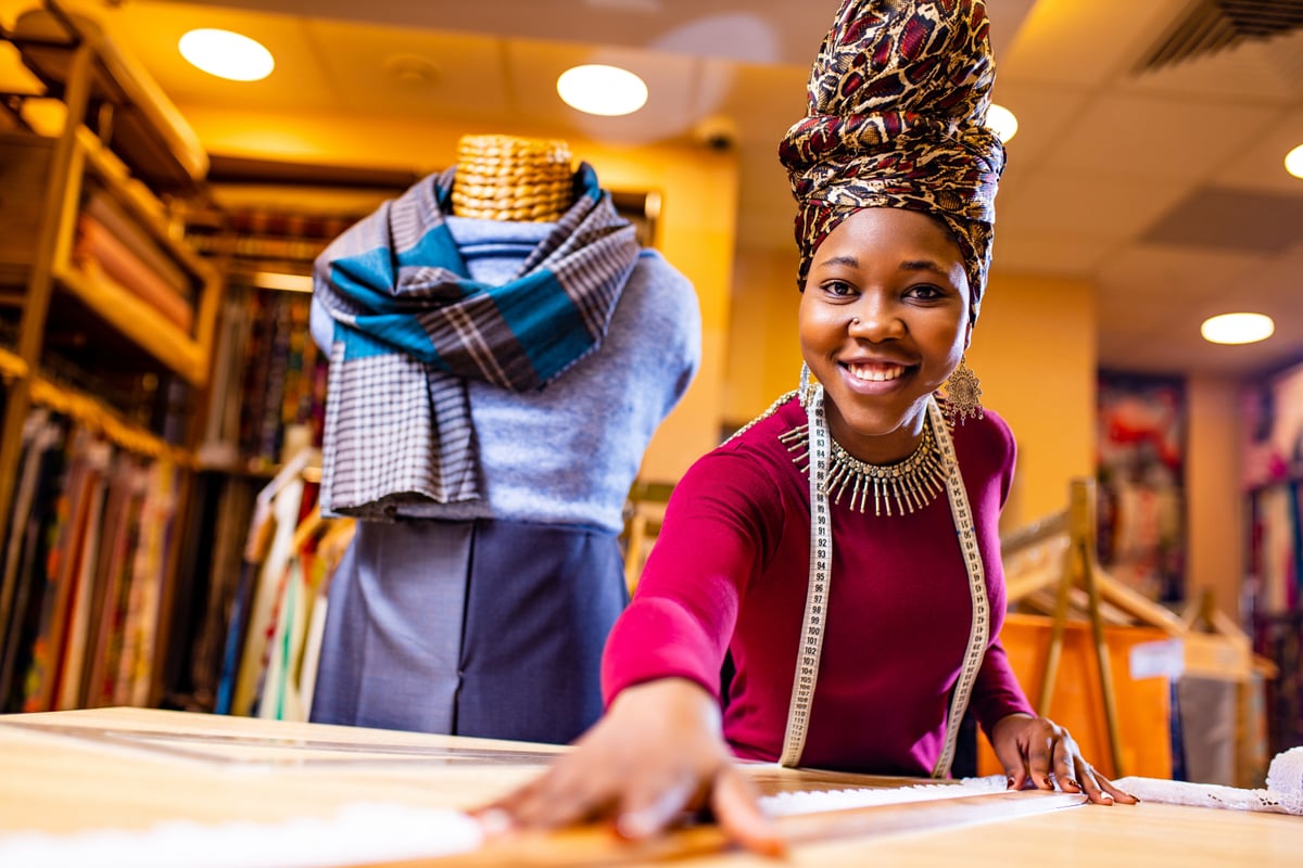 Kenyan businesswoman entrepreneur - tailor in retail shop